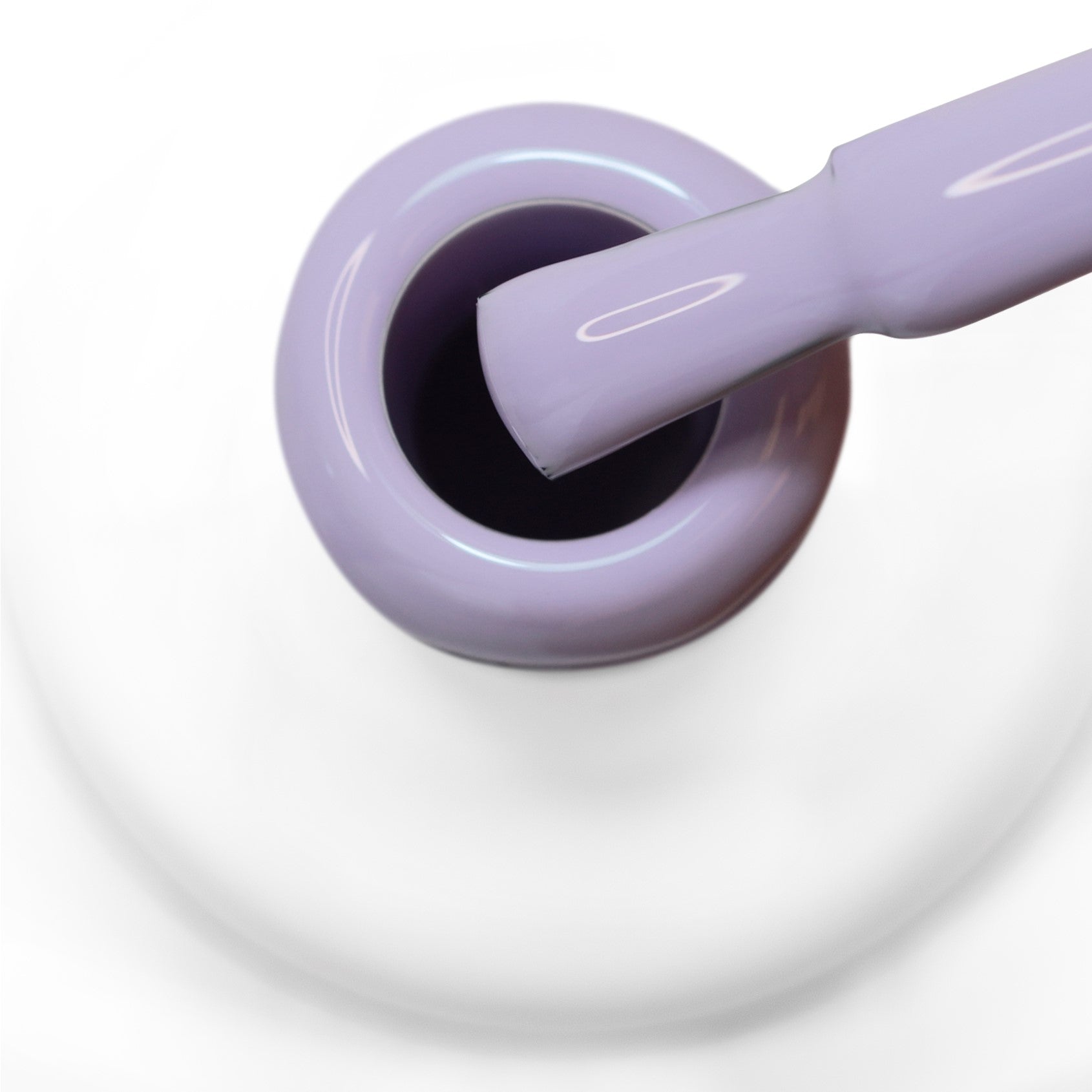 Pincel a sair do gargalo a mostrar a cor lilás