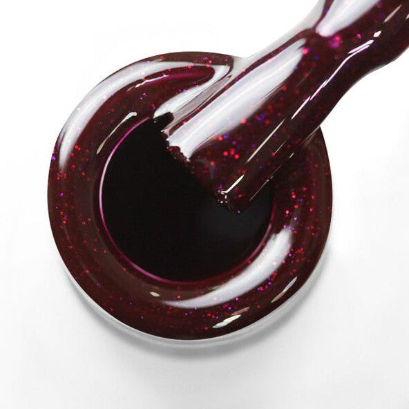 Pincel em cima do gargalo a mostrar a cor