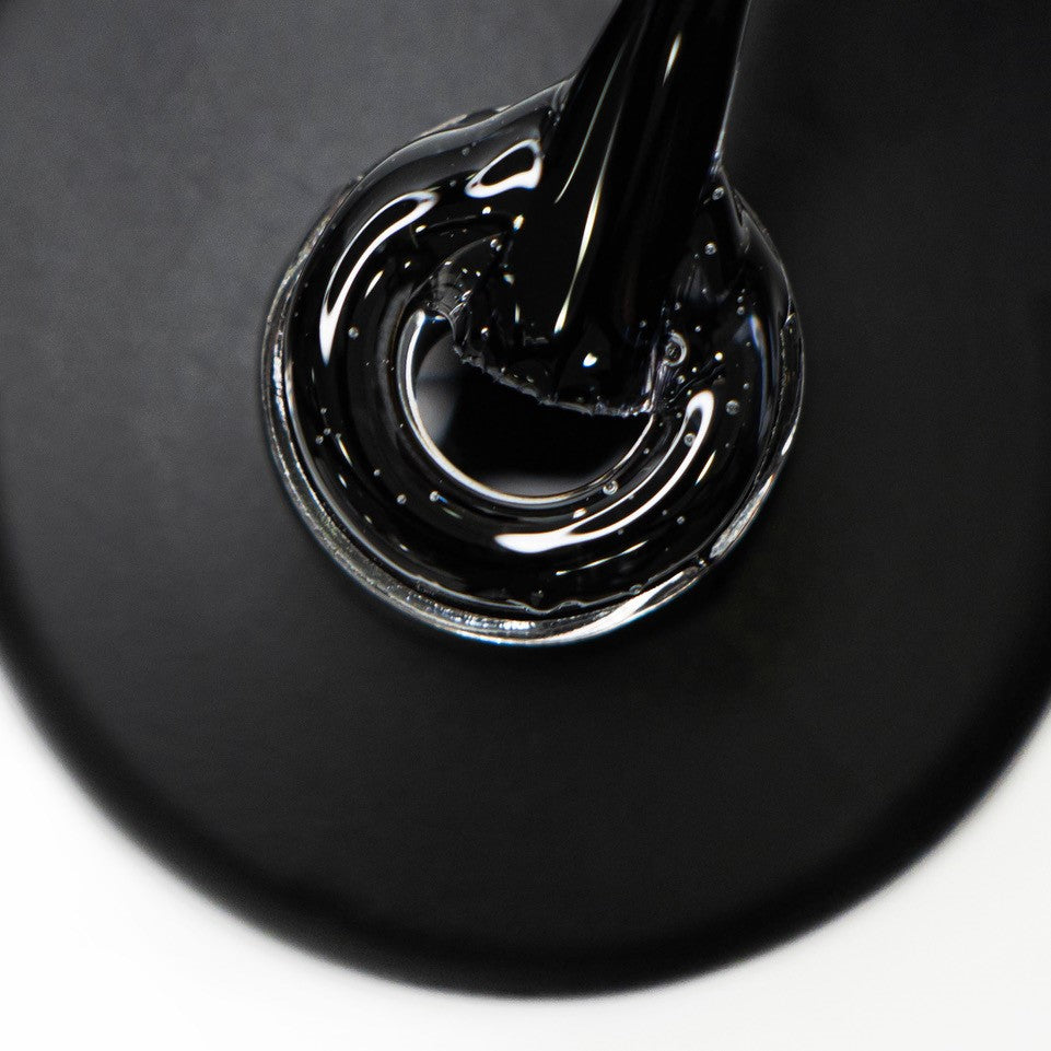 Pincel e gargalo a mostrar a cor transparente