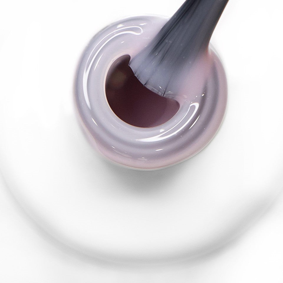 Pincel a sair do gargalo e a mostrar a cor