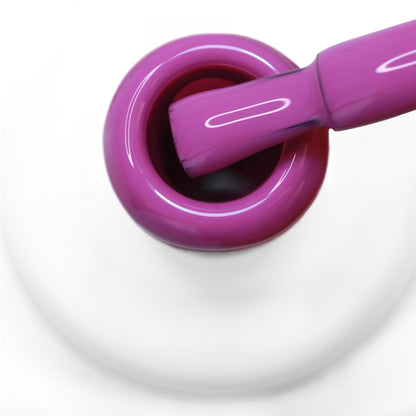 pincel a sair do gargalo a mostrar a cor roxa