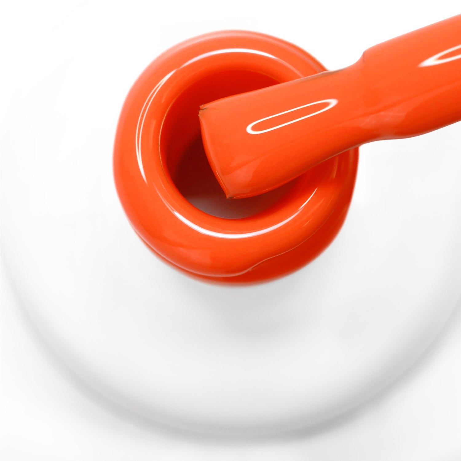 pincel a sair do gargalo a mostrar a cor laranja