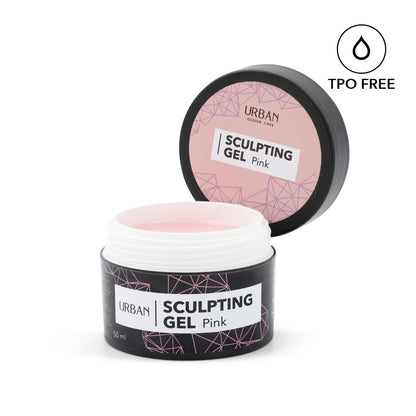 Boião preto aberto com rotulo rosa a mostrar o produto