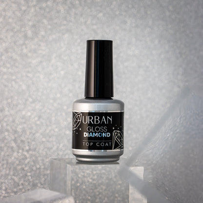 Boião prateado com rótulo preto e tampa preta com fundo ambiente cinzento