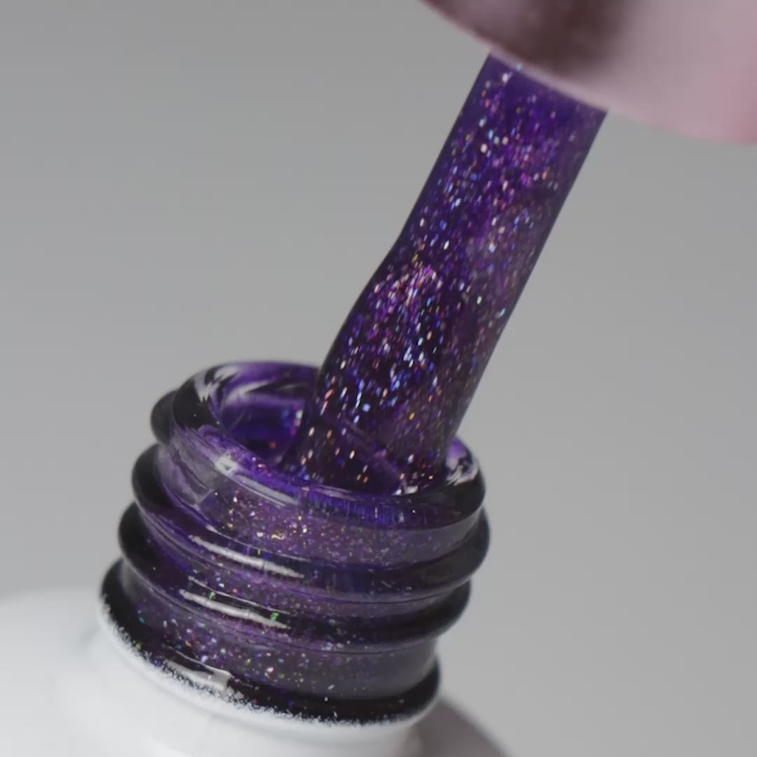 Pincel a sair do boião a mostrar a cor