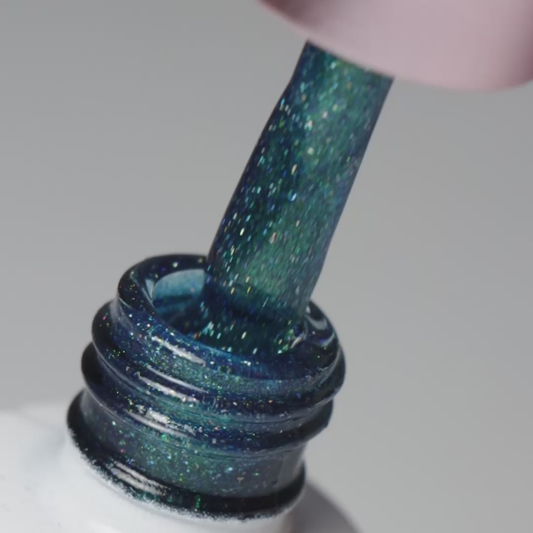 Pincel a sair do boião e mostrar a cor